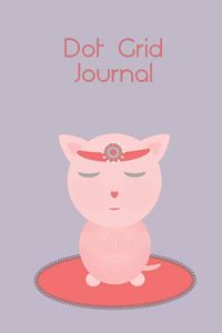 Peach cat meditating dot grid journal